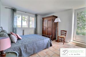 Postel nebo postele na pokoji v ubytování Domaine de la Rochere + 12 fotografií