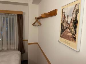 Postel nebo postele na pokoji v ubytování Toyoko Inn Busan Seomyeon