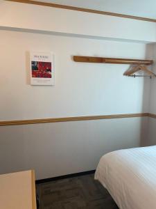 Postel nebo postele na pokoji v ubytování Toyoko Inn Busan Seomyeon