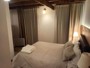 Letto o letti in una camera di Casa dos Conchos Sabugueiro Casa com 4 quartos