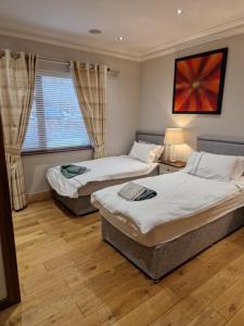 Postel nebo postele na pokoji v ubytování Mullingar town apartment 2 bedrooms