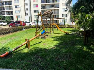 Kawasan permainan kanak-kanak di Moderno y Acogedor apartamento