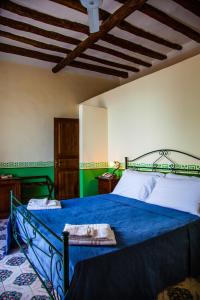 Postel nebo postele na pokoji v ubytování Hotel Arcangelo - Salina