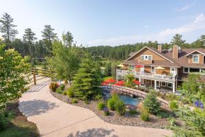 an aerial view of a large house with a garden at Summer Creek Inn in Johnson Siding