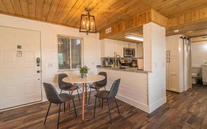 a kitchen and dining room with a table and chairs at Morning Vista in Gatlinburg