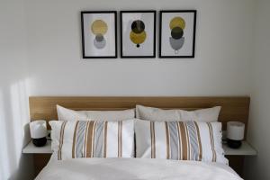 A bed or beds in a room at Valtellina Vacanze