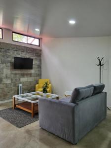 TV a/nebo společenská místnost v ubytování Casa del Café - Loft