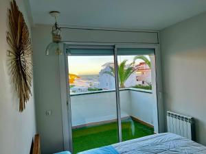 A bed or beds in a room at La Marina de Aiguadolç