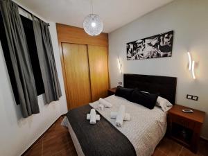 Posteľ alebo postele v izbe v ubytovaní Apartamento Eursu centro con piscina + 25 fotografií