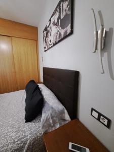 Posteľ alebo postele v izbe v ubytovaní Apartamento Eursu centro con piscina