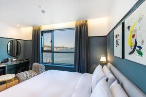 Postel nebo postele na pokoji v ubytování Brown Dot Hotel Ulsan Jangsaengpo
