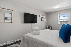Gulta vai gultas numurā naktsmītnē Gazebo 4BR Ping Pong Arcade Room