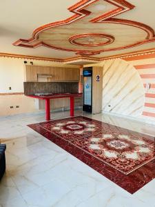 a large room with a table and a ceiling at DIAMEZ HOTEL PLAZA in Sacaba