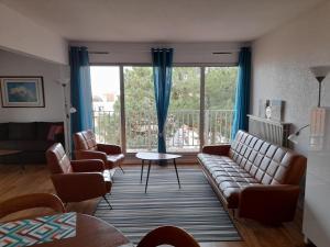 Appartement Arcachon, 3 pièces, 9 personnes - FR-1-319-345にあるシーティングエリア