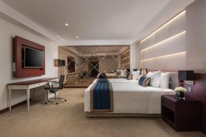 Katil atau katil-katil dalam bilik di Yangon Thanlwin Hotel