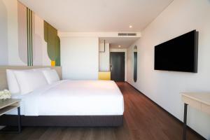 ibis Styles Ambassador Incheon Airport T2客房内的一张或多张床位