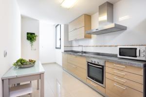 Dapur atau dapur kecil di Apartamento Jade