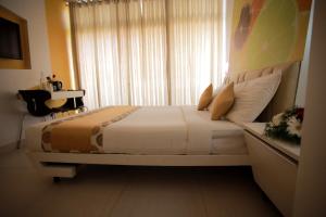Letto o letti in una camera di Millennium Continental