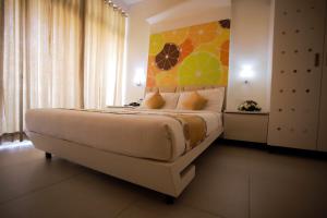 Letto o letti in una camera di Millennium Continental