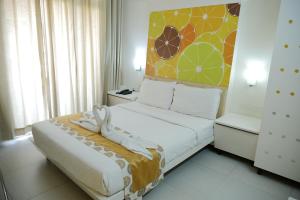 Letto o letti in una camera di Millennium Continental