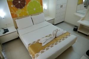 Letto o letti in una camera di Millennium Continental