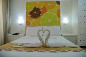 Letto o letti in una camera di Millennium Continental