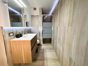 a bathroom with a sink and a toilet at Catanese Proverb's House - Via Napoli in Catania