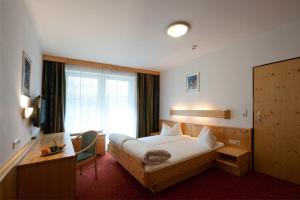 Postel nebo postele na pokoji v ubytování Hotel Bierwirt