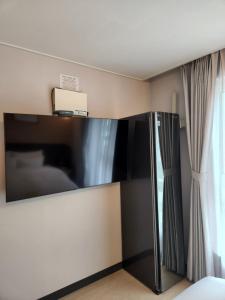 Postel nebo postele na pokoji v ubytování Hound Hotel Busan Station