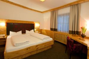 Postel nebo postele na pokoji v ubytování Hotel Bierwirt
