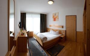 Postel nebo postele na pokoji v ubytování Hotel Bierwirt