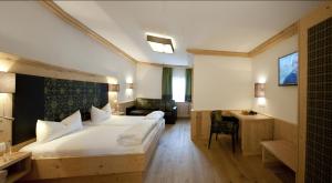 Postel nebo postele na pokoji v ubytování Hotel Bierwirt