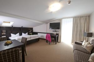 Postel nebo postele na pokoji v ubytování Hotel Bierwirt