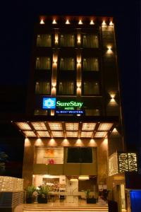 a building with a sign on the front of it at SureStay by Best Western Model Town in Amritsar