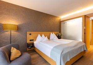 Postel nebo postele na pokoji v ubytování Hotel Katharinenhof COMFORT