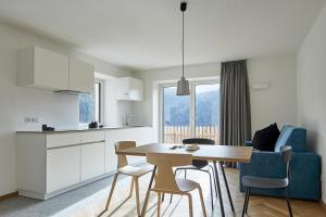 Kuchyň nebo kuchyňský kout v ubytování Casa Lies - Apartments