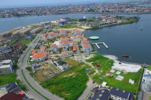 an aerial view of an island in a body of water at Luxury Condo in Ikoyi (banana Island) in Araromi