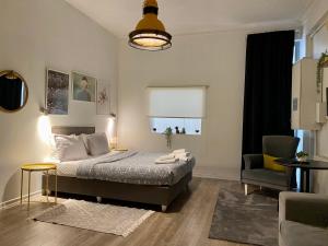 Postel nebo postele na pokoji v ubytování Flats Company - Karakoy Apartment