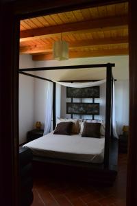 Säng eller sängar i ett rum på Agriturismo La Casa in Collina