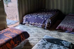 Postel nebo postele na pokoji v ubytování Camel Trek Bivouac