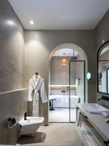 a bathroom with a sink and a bath tub at The Earth Amritsar, Trademark Collection by Wyndham in Amritsar