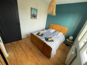 Posteľ alebo postele v izbe v ubytovaní Maison cosy proche du port et des commerces