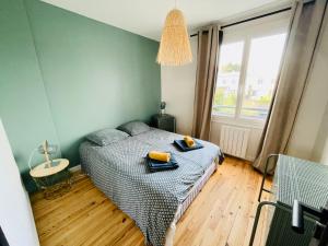 Posteľ alebo postele v izbe v ubytovaní Maison cosy proche du port et des commerces