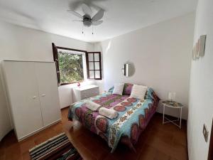 Ένα ή περισσότερα κρεβάτια σε δωμάτιο στο Paradise Beachfront Villa, Porto Columbu, Sardinia
