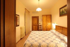 Postel nebo postele na pokoji v ubytování Hotel Margaret