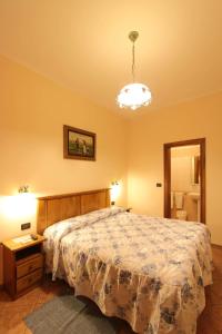 Postel nebo postele na pokoji v ubytování Hotel Margaret
