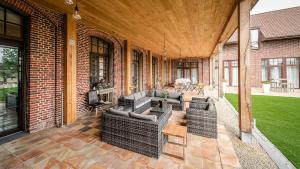 Posezení v ubytování Hotel De Pupiter