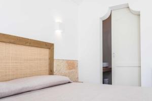 Postel nebo postele na pokoji v ubytování Dimora dei maestri-Camera con veranda e bagno privati