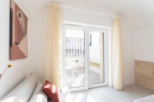 Postel nebo postele na pokoji v ubytování Dimora dei maestri-Camera con veranda e bagno privati