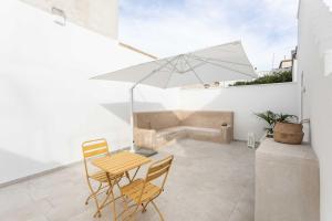 Posezení v ubytování Dimora dei maestri-Camera con veranda e bagno privati